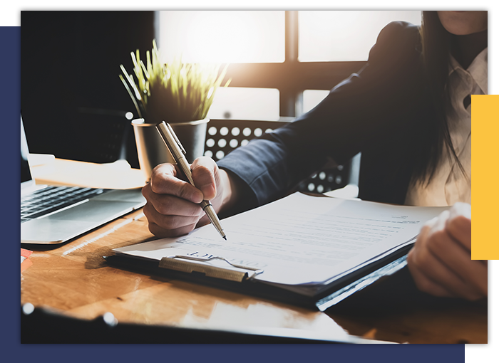 image of a lawyer signing a contract